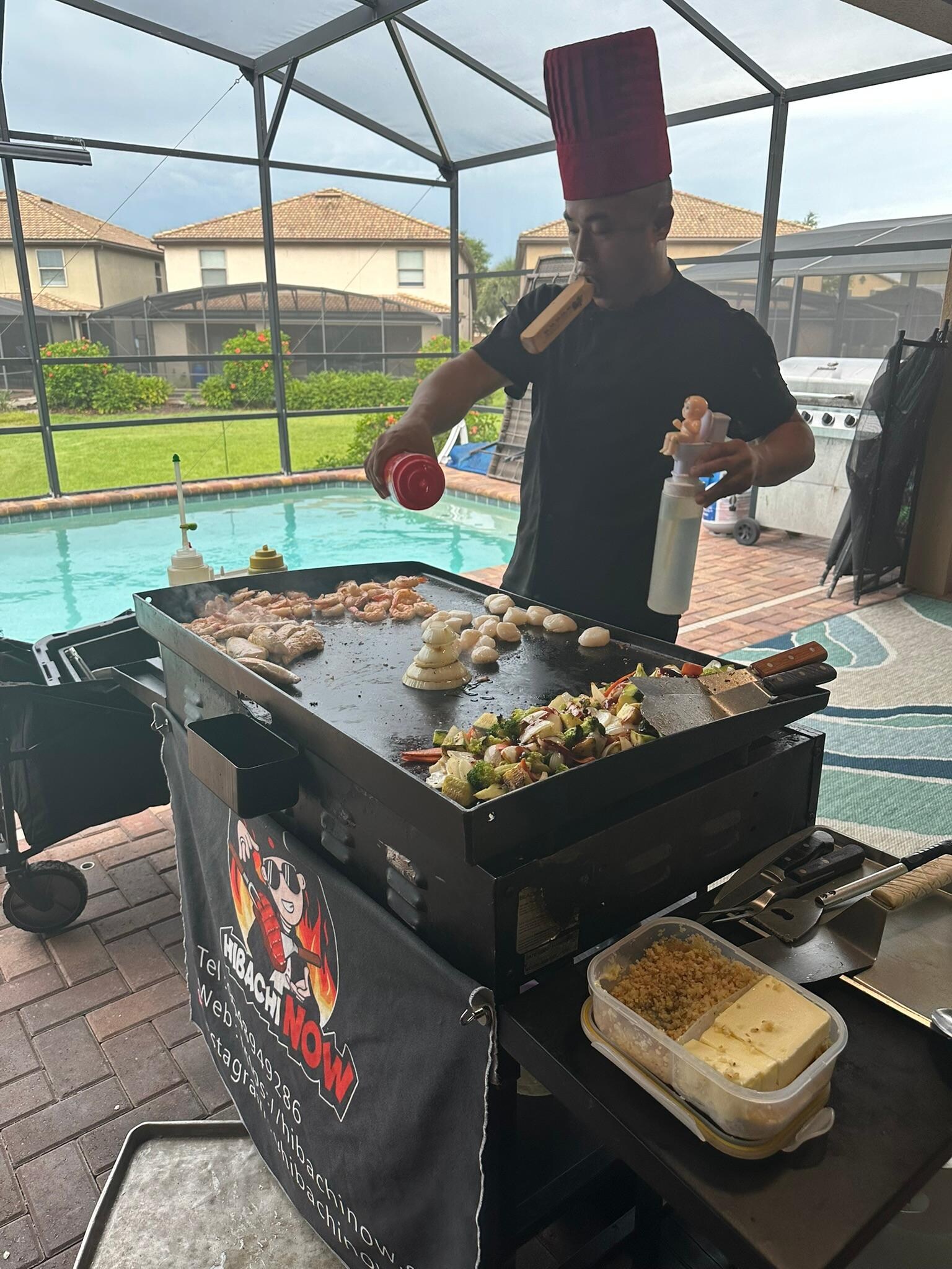 Dinner by the pool with Hibachi Now to celebrate high school graduates.