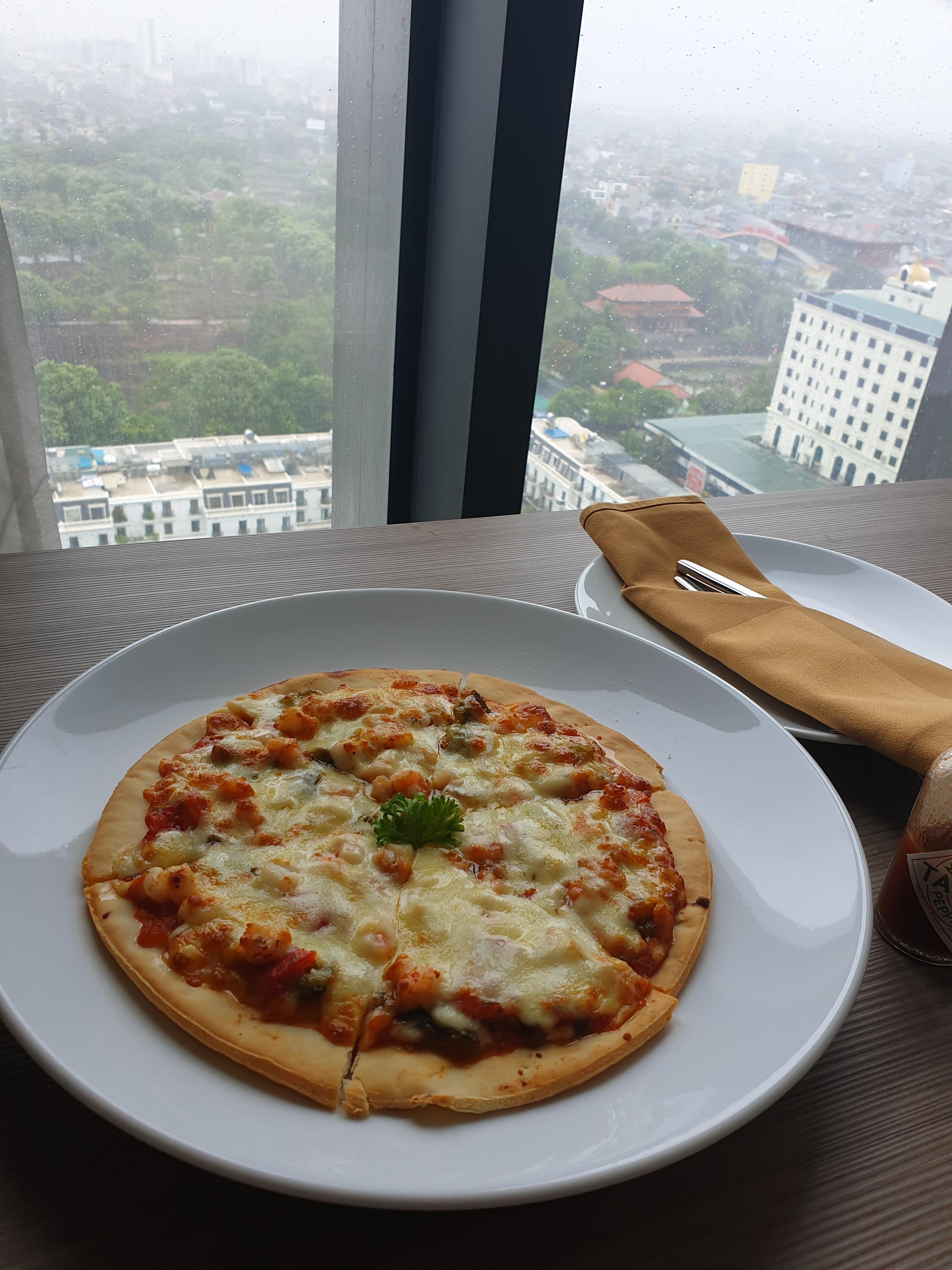 Room service-seafood pizza