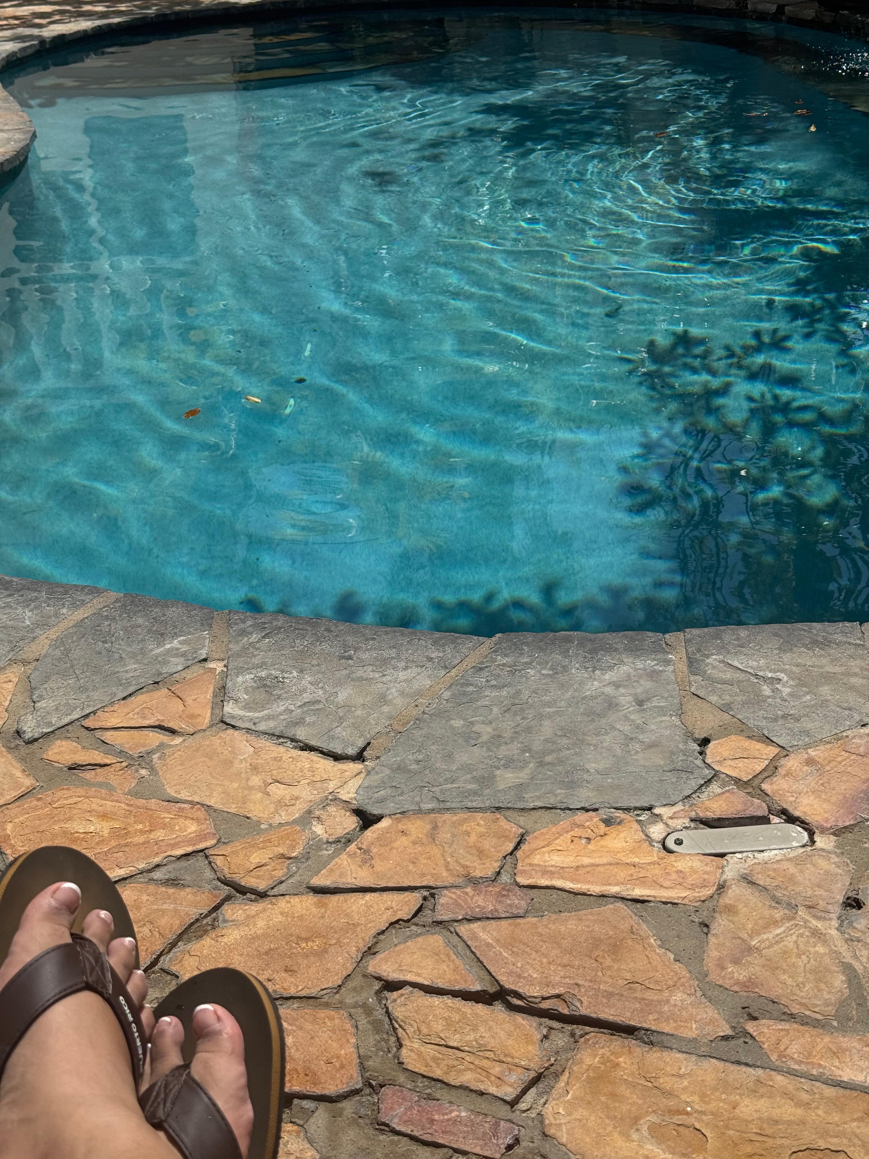Relaxing at the pool while reading a book