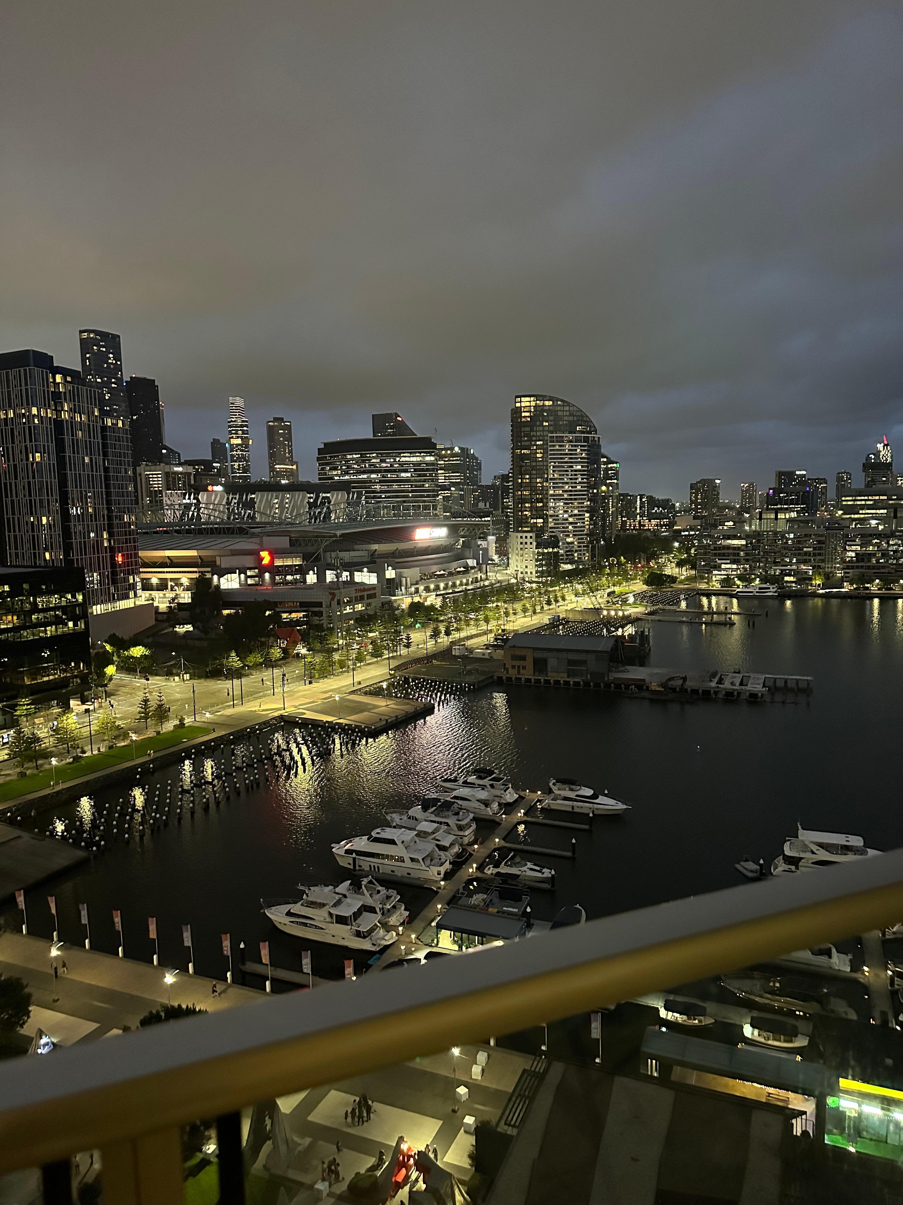 Beautiful night time view of city lights looking over the harbour. 