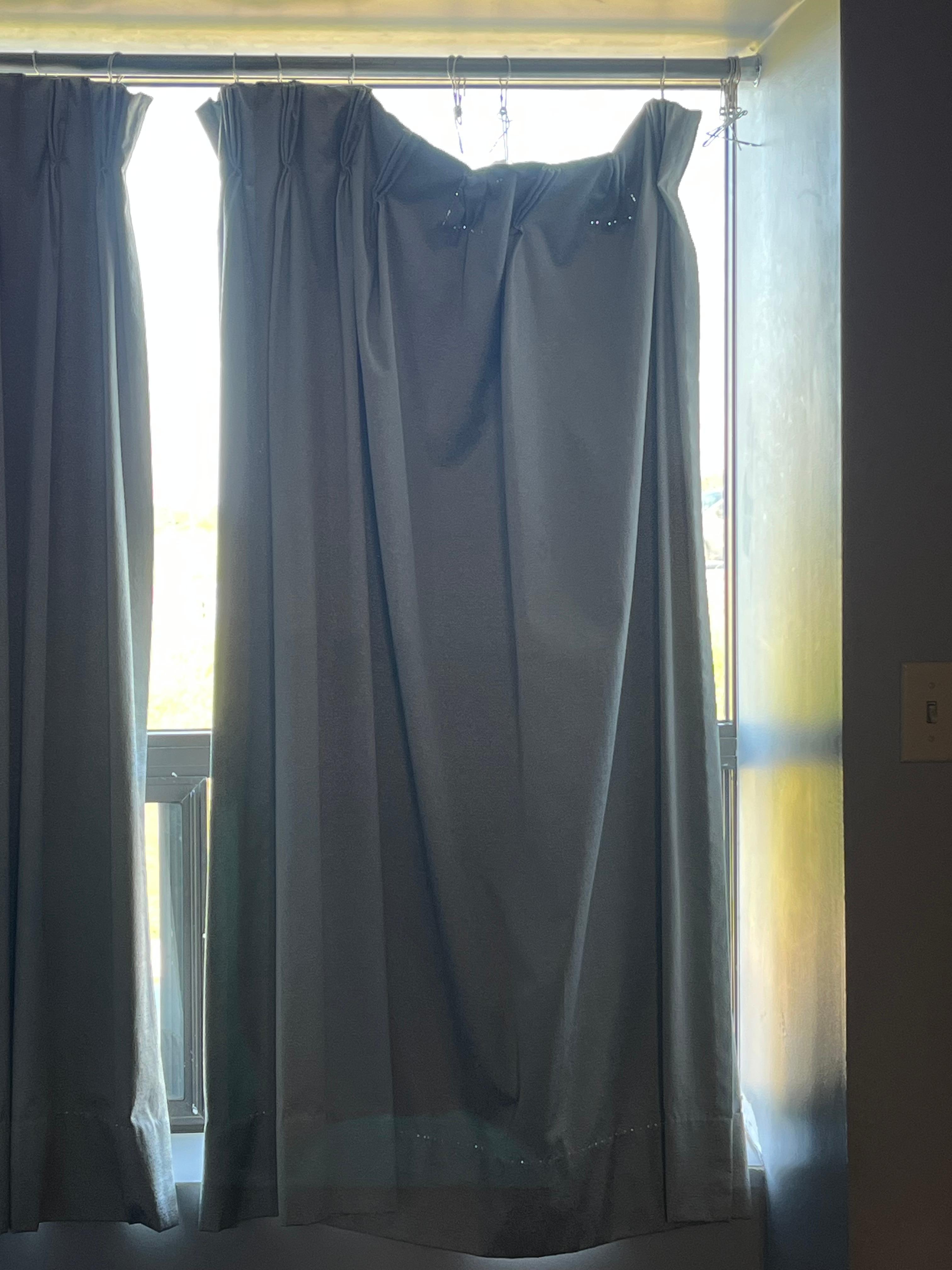 Curtains barely holding on. They used shower curtain hooks and it was ripped and couldn’t be fixed.