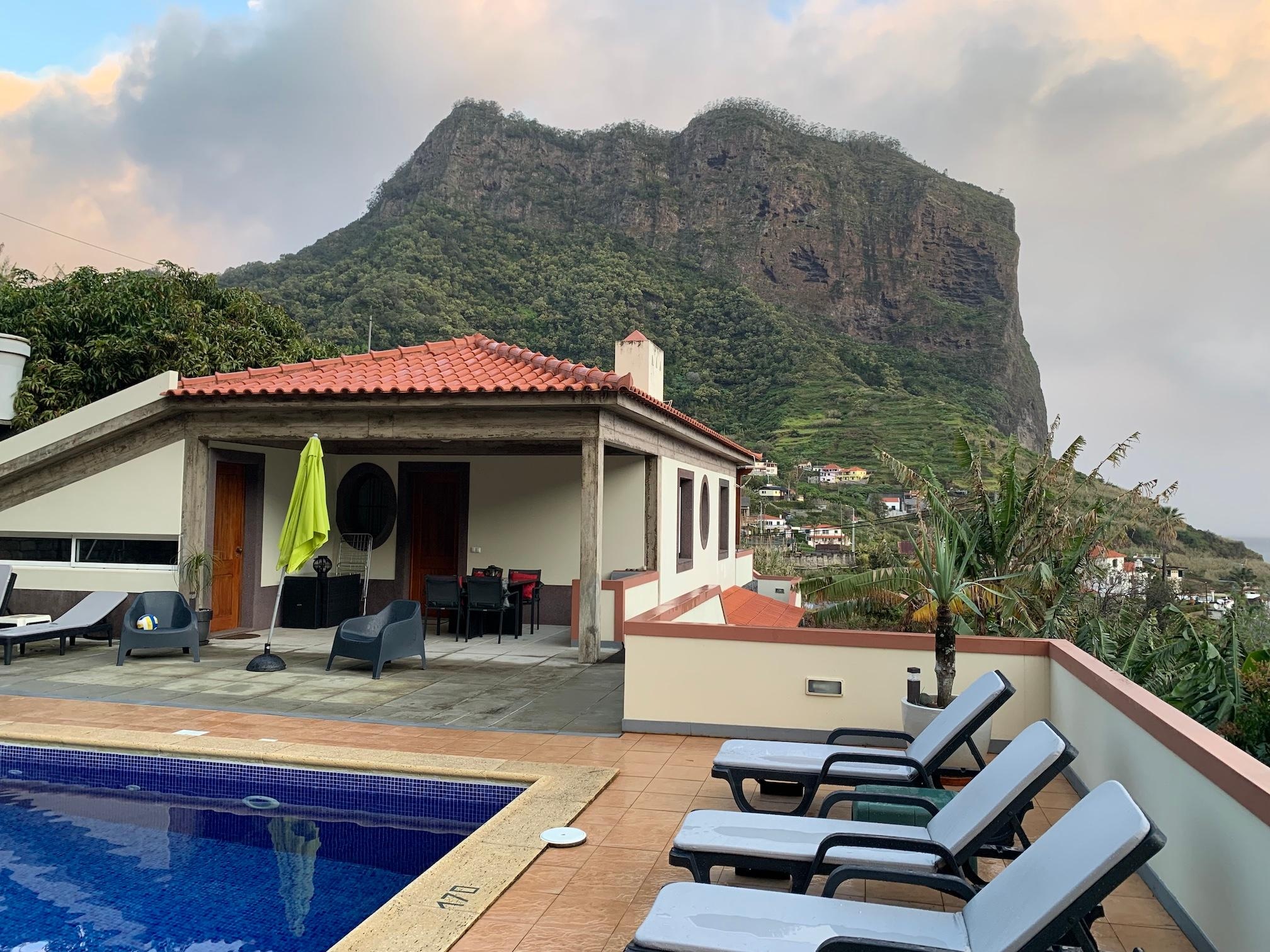 Pool area and lounge chairs.