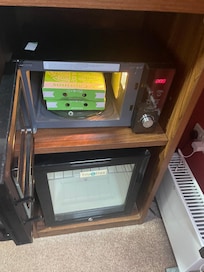 The microwave and fridge