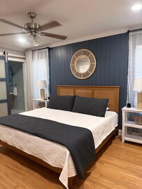 Primary bedroom with an ensuite and a King bed.