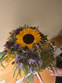 Velkomstblomst som hotellet hjalp os med at få leveret