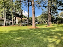 The apartment is over the carport, 2 bedrooms, and good sized dining area with microwave.
