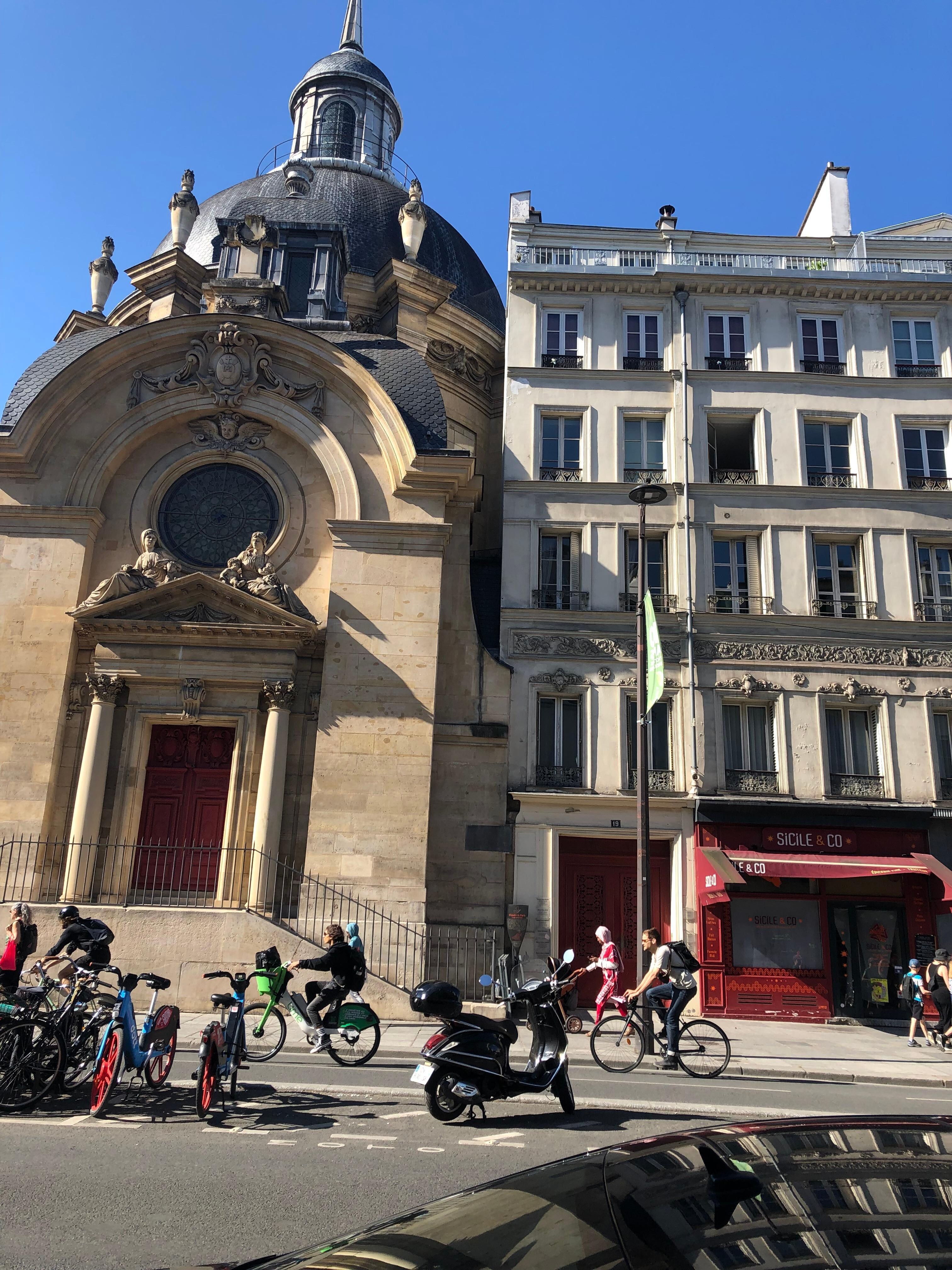 The apartment building and the church from across the street. 