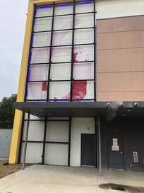 Street-side facade suggests someone gave up on this place some time ago........