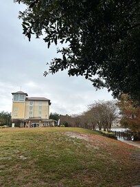 Little walkway and green space in front of the hotel