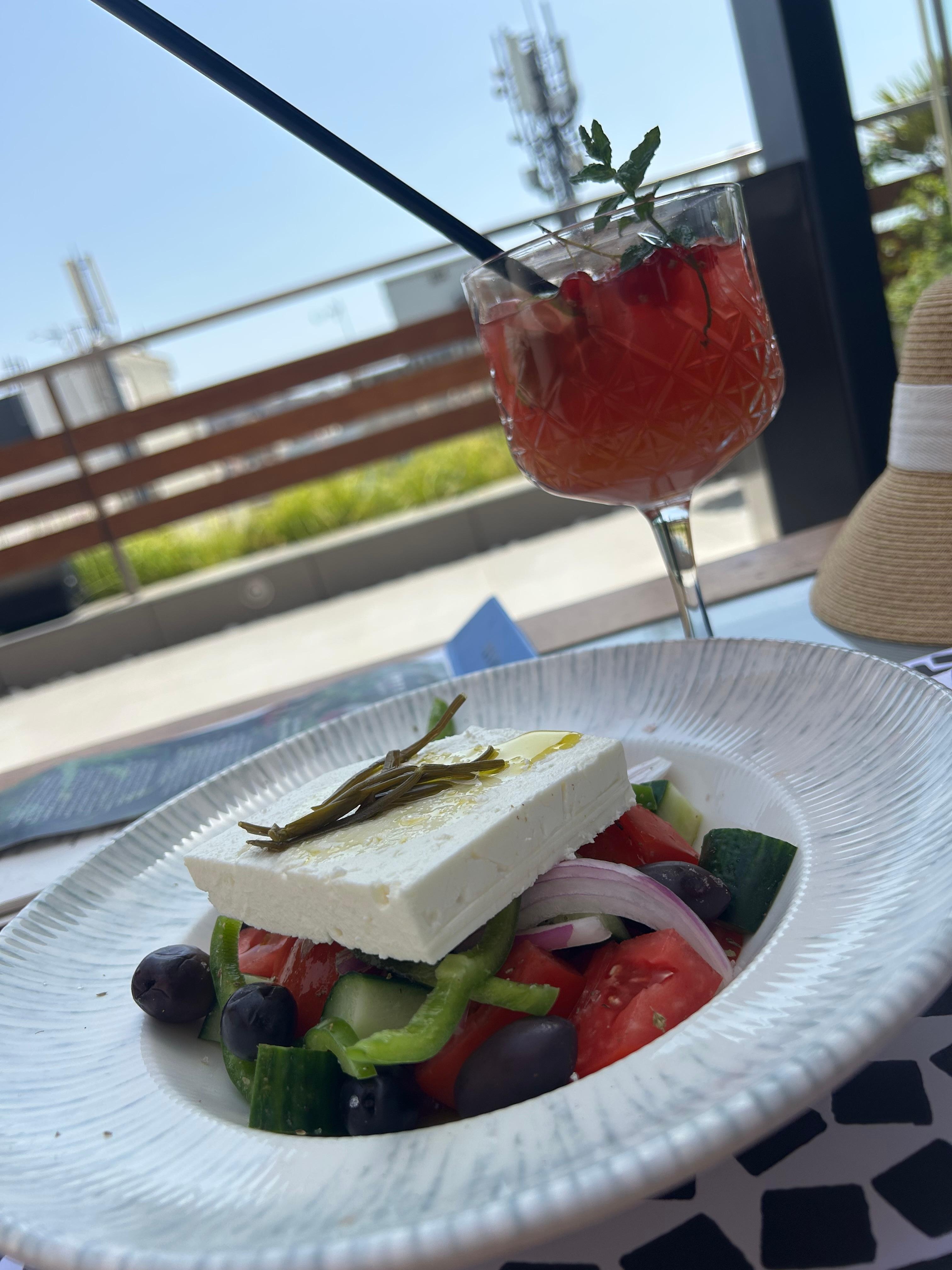 Salad and drink on upper patio 