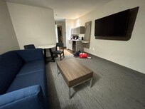 Big spacious room with living area separate from bedroom.