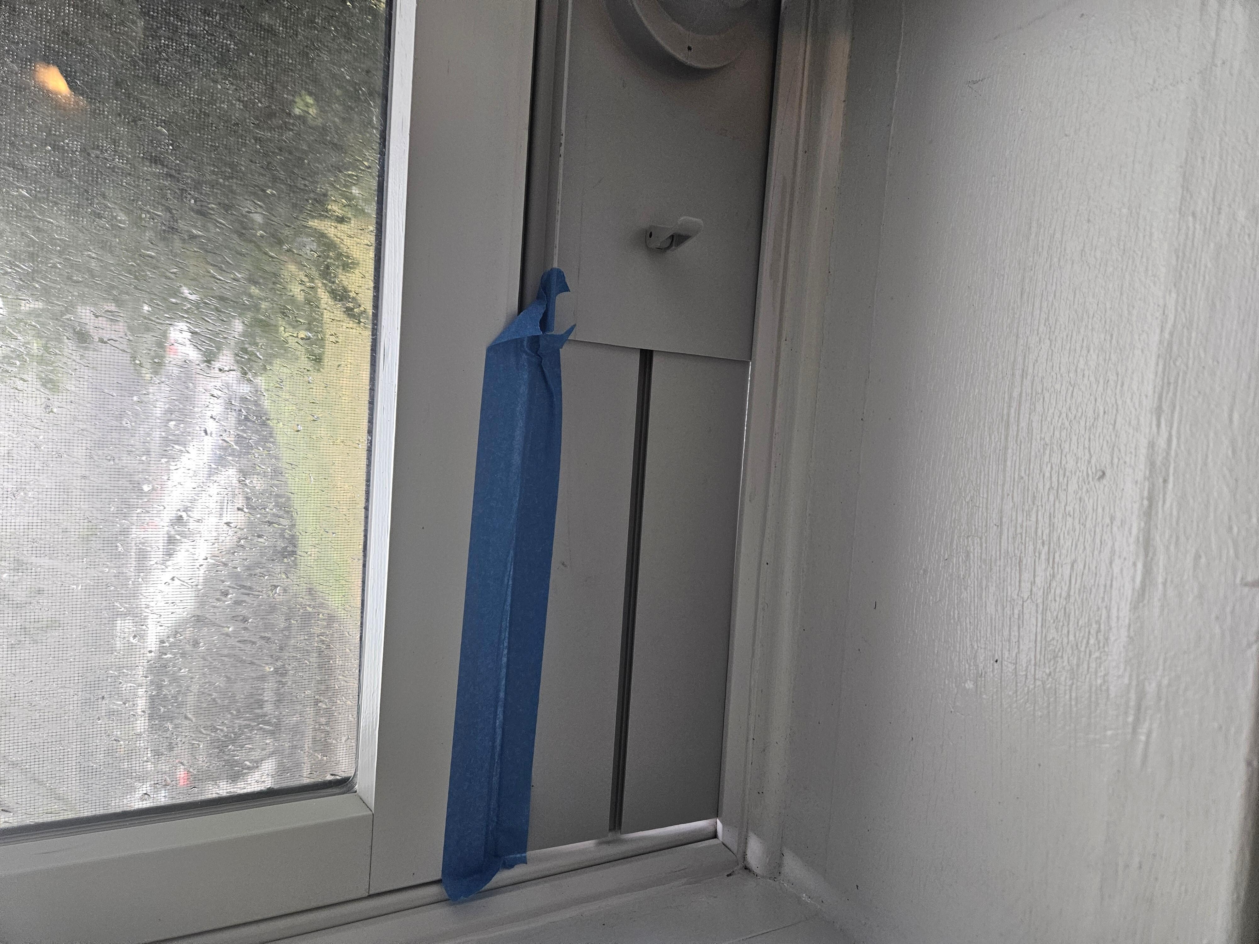 Painters tape did not hold the frame in place. Outside hot air seeping through the hole.