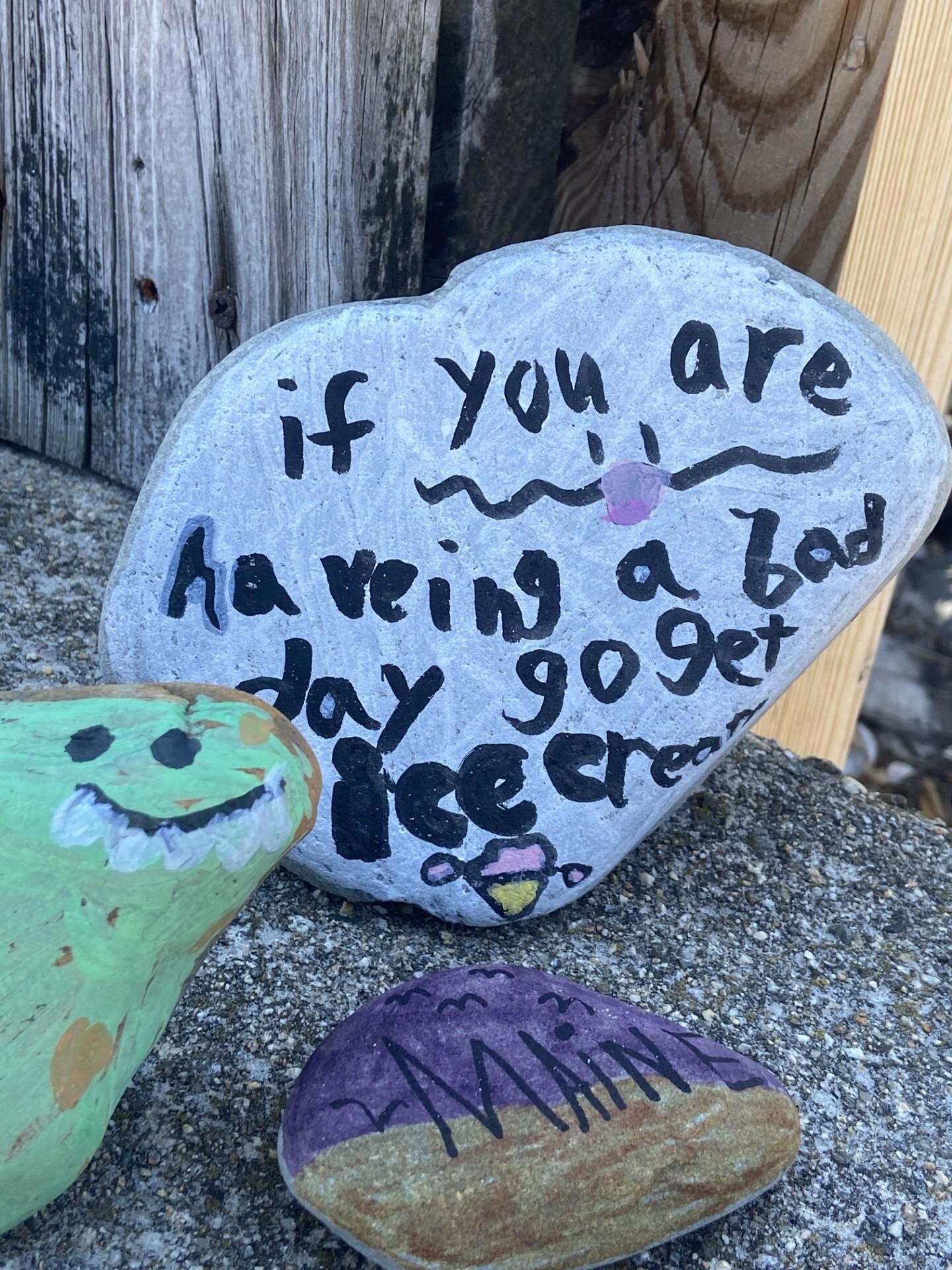 Charming painted rocks near closest beach entrance