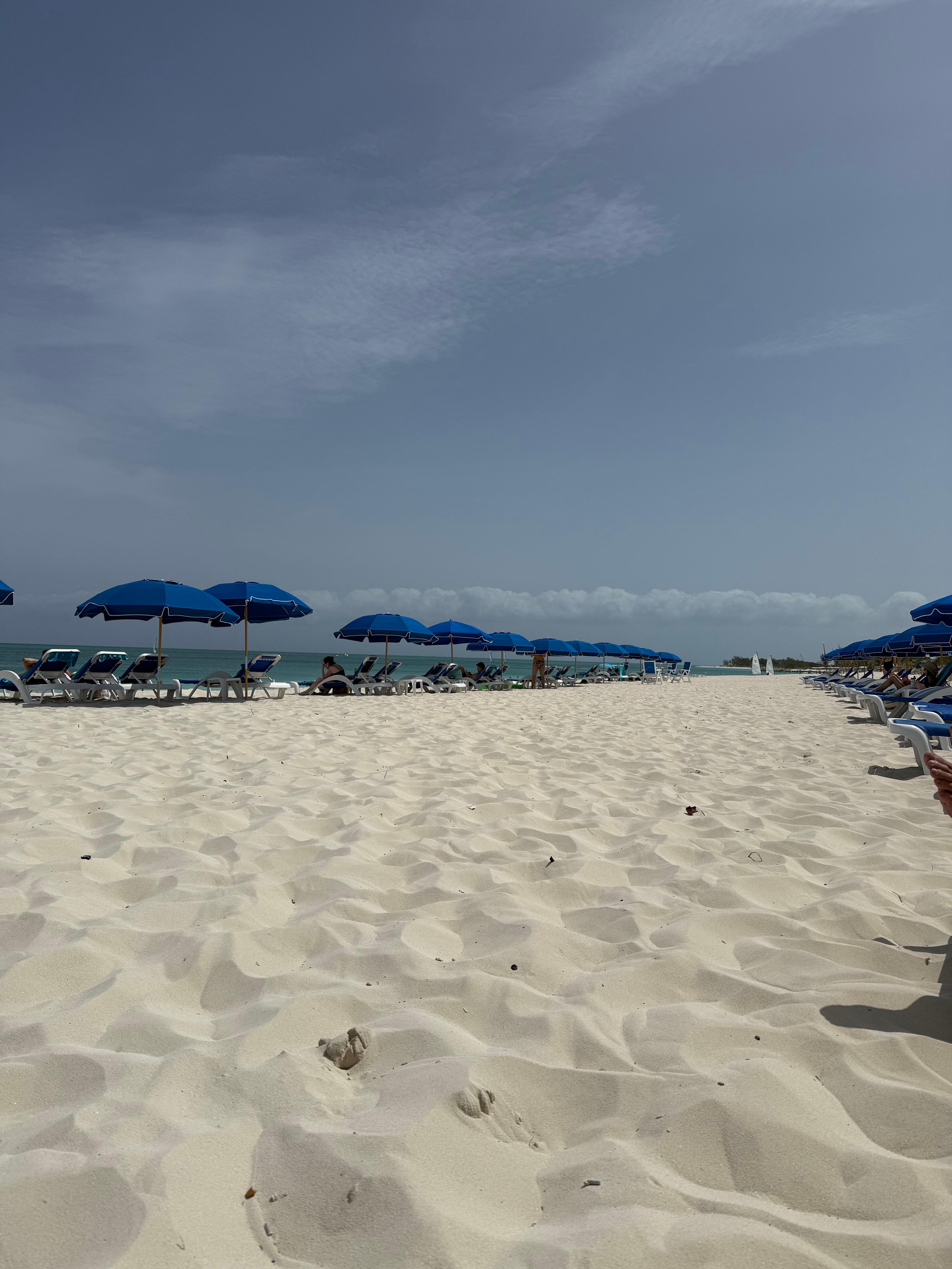 RWI beach access with chairs and umbrellas