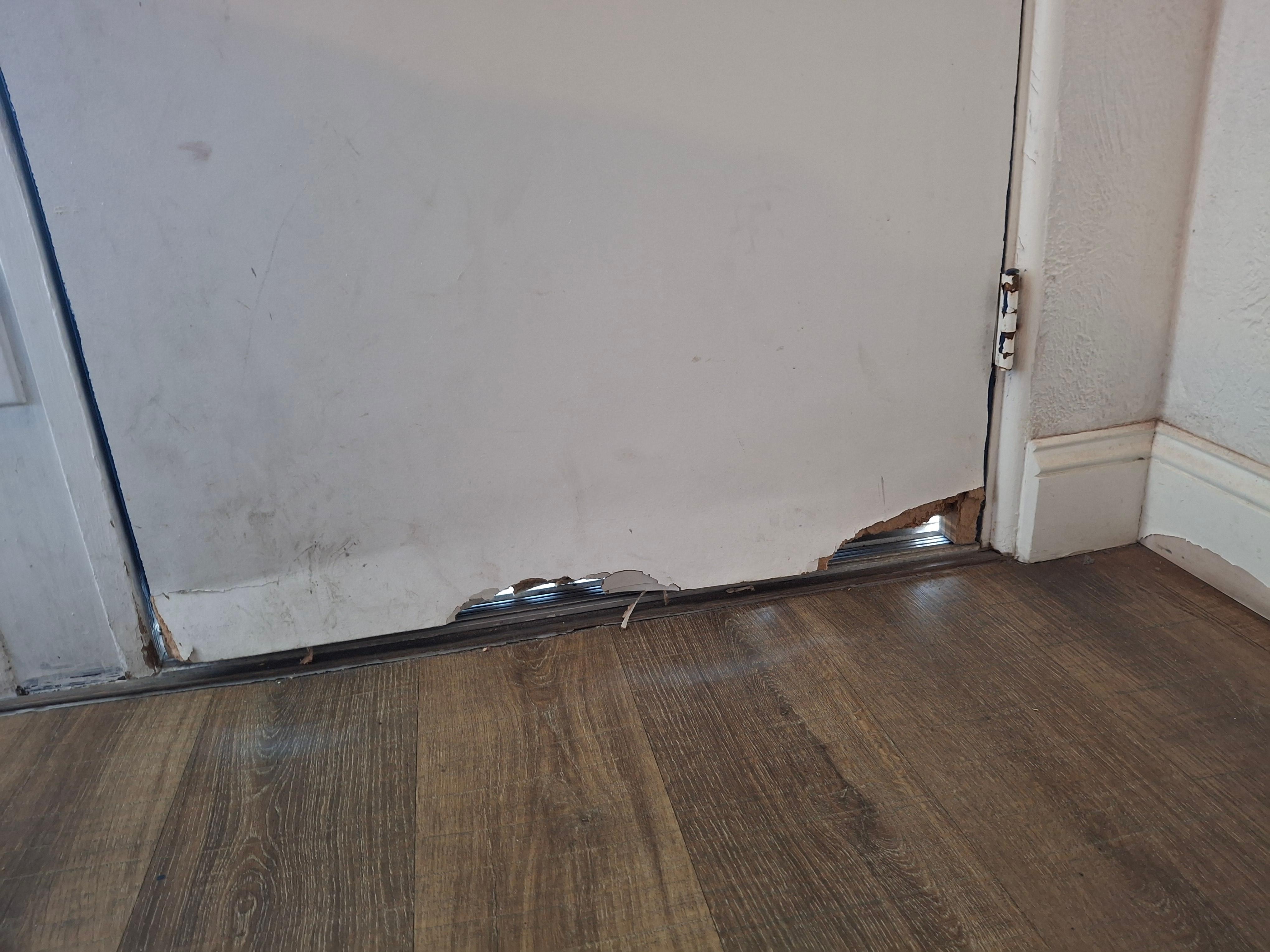 Bottom of door broken.