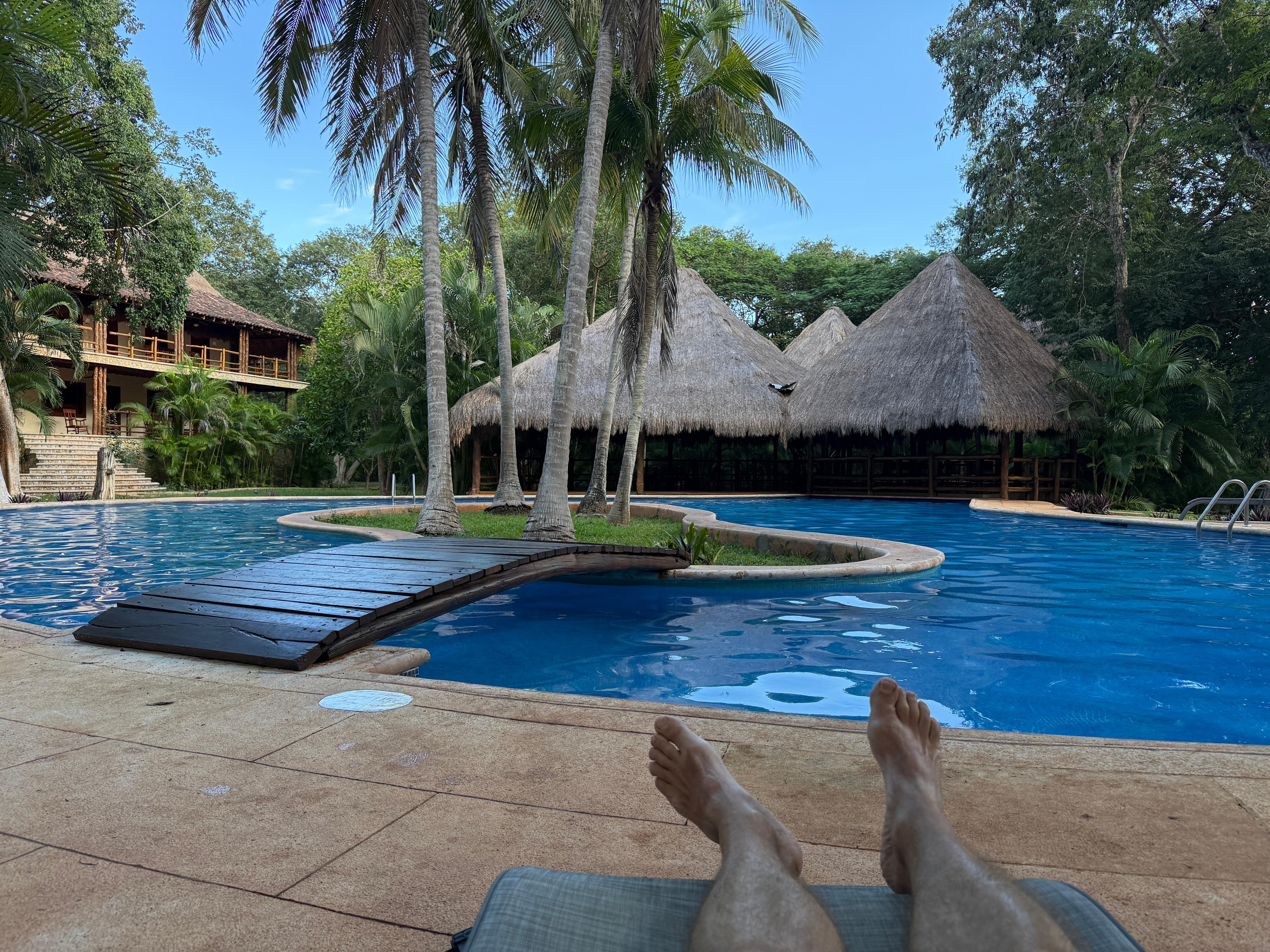 Lying by the pool after a refreshing swim.