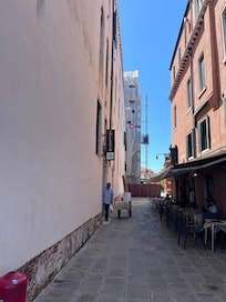 entry is in the little street adjacent to the hotel