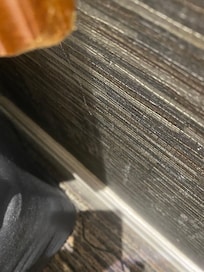 Behind and side of bed