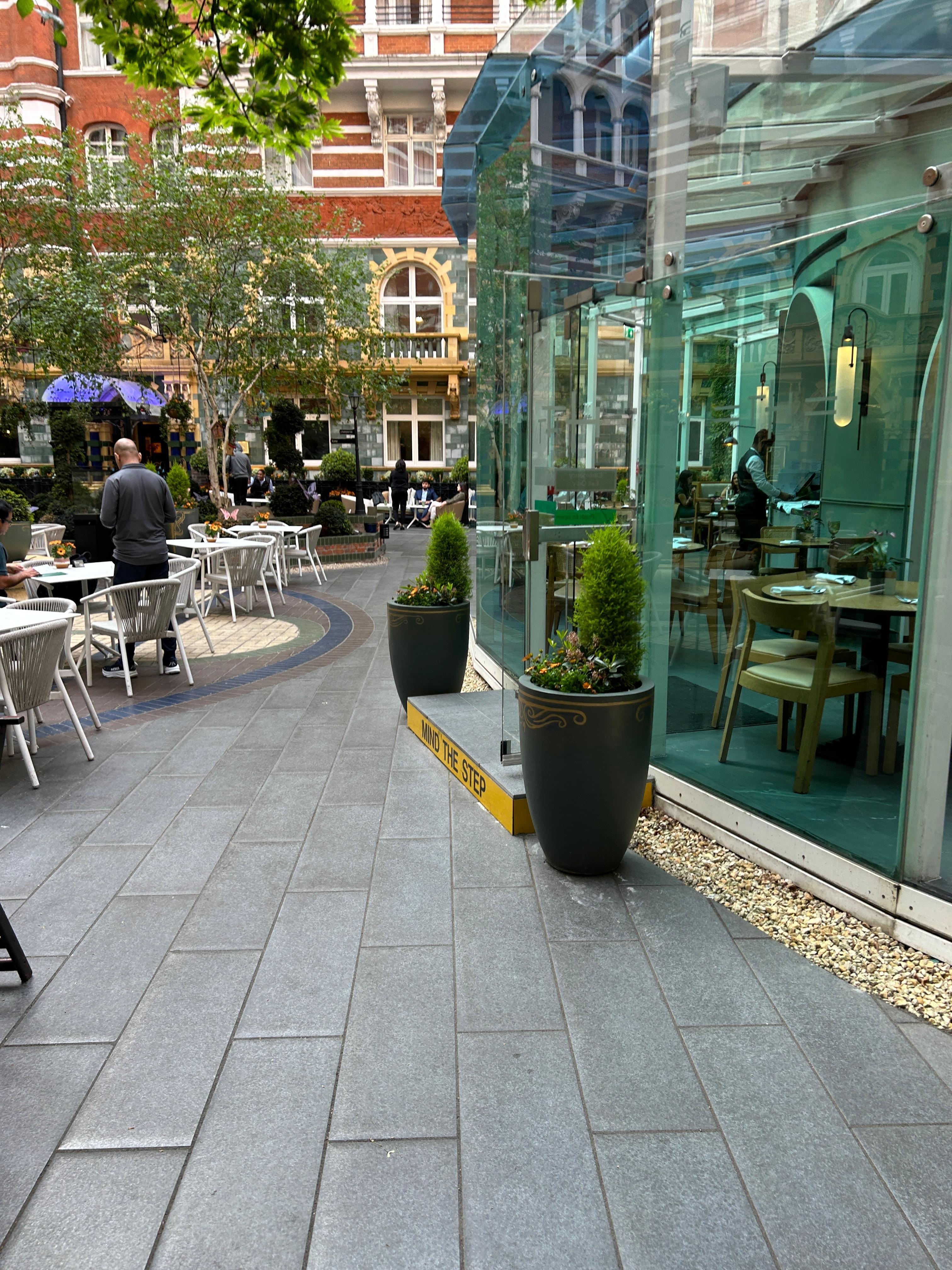 Courtyard ahead - breakfast area to right 
