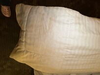 Dirty bedding that had not been changed from previous guest