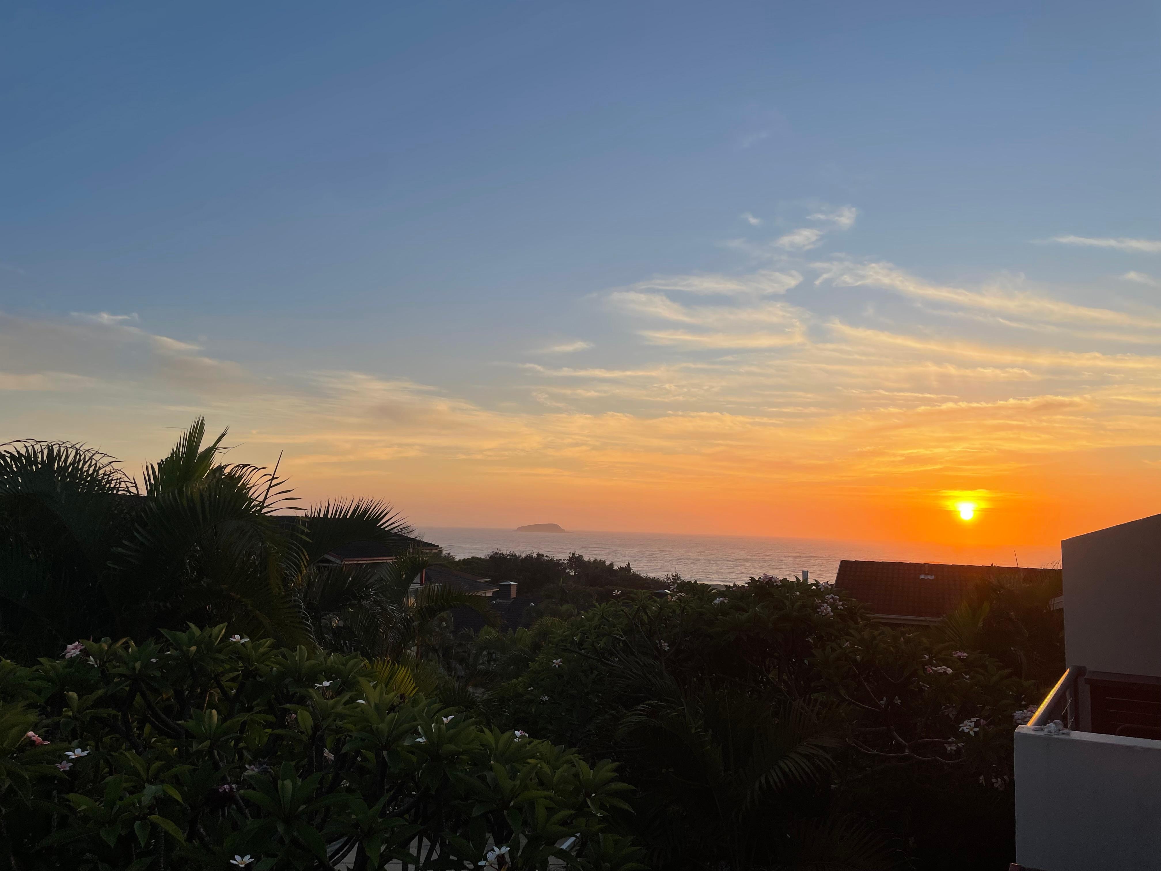Coffee and sunrise on the balcony