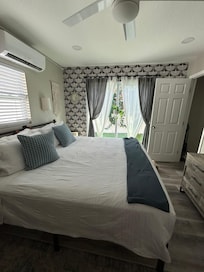 Pretty bedroom with a king sized bed