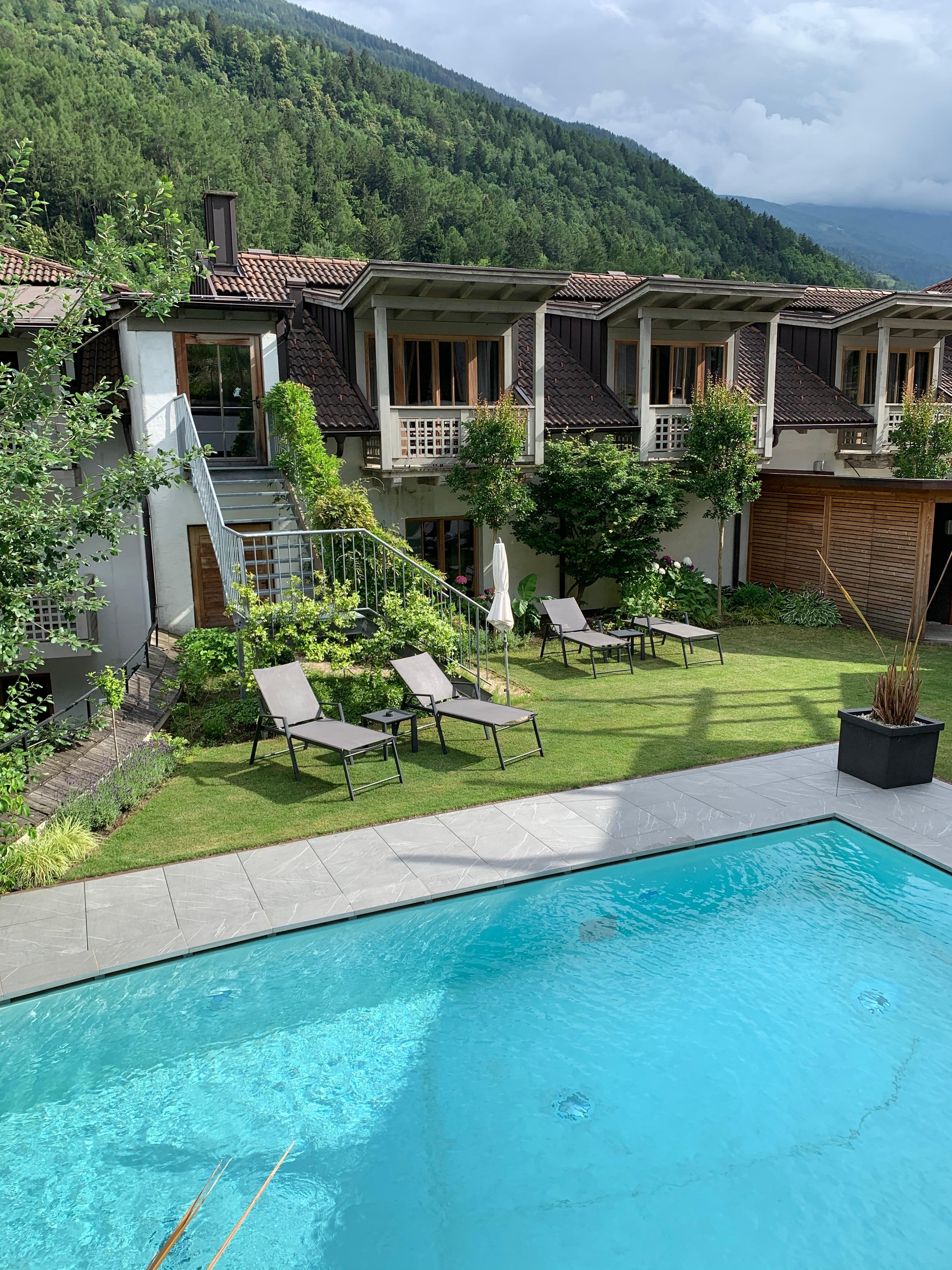 Pool and L classic garden rooms above the pool.