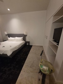 Dingy room with tiny tv