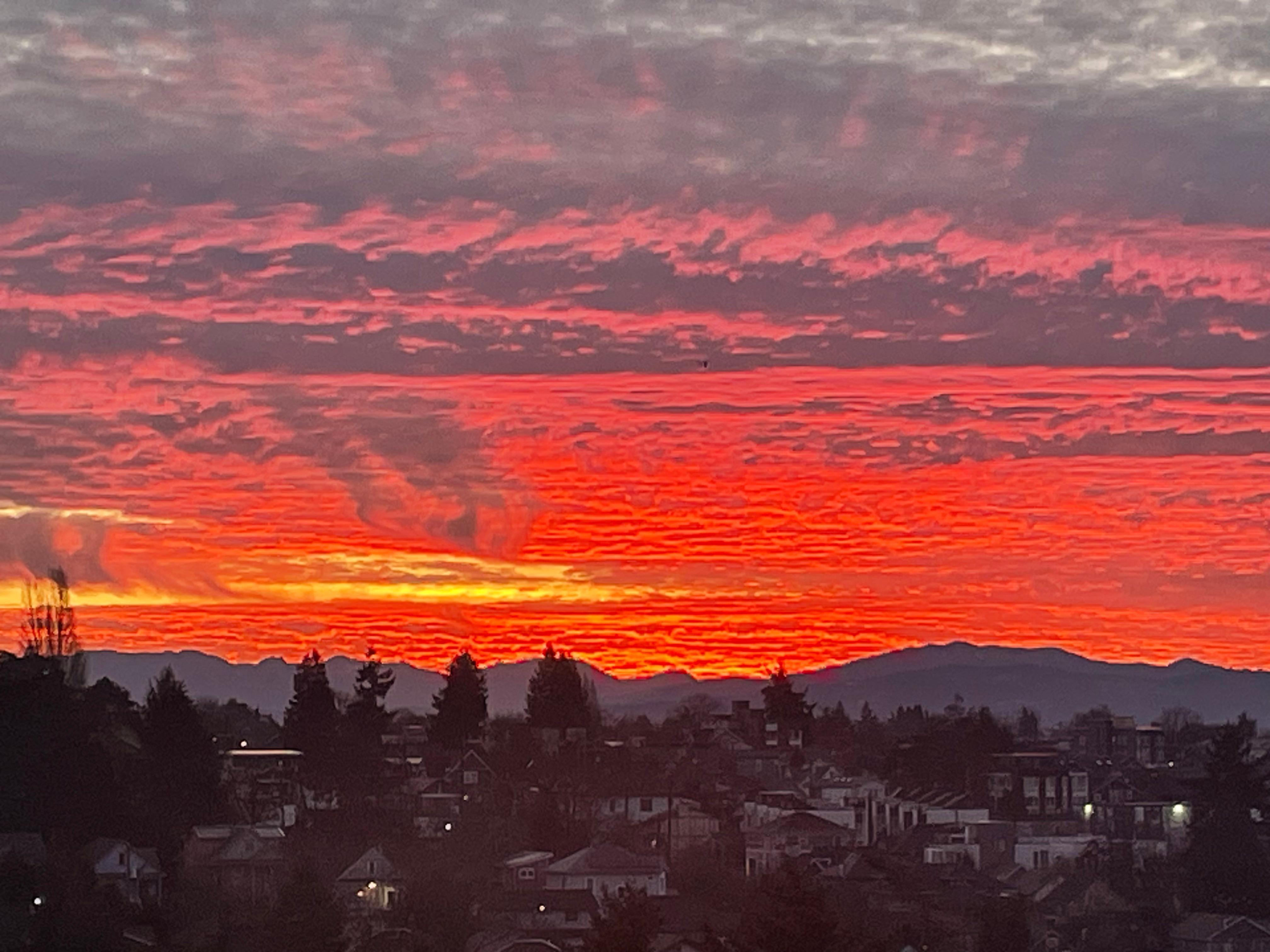 Sunrise from the living room balcony.