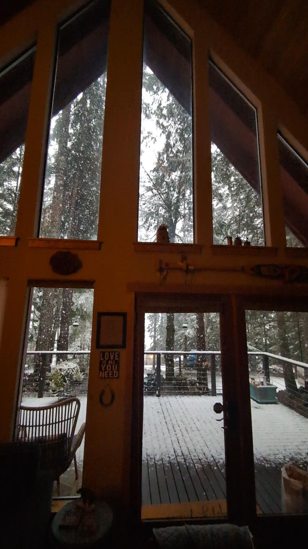 Watching the snow through the A frame windows 😍