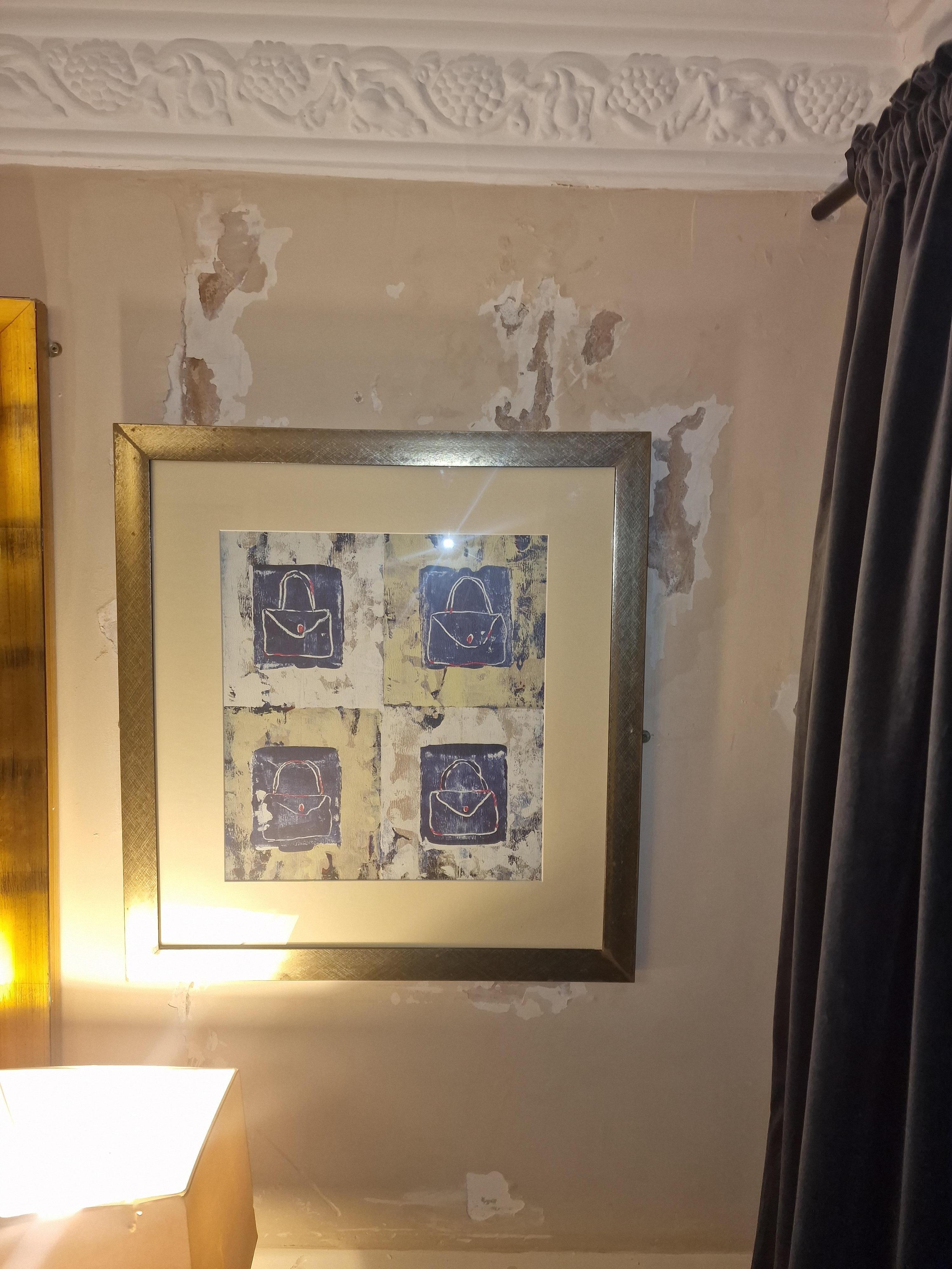 Hidden behind picture flaking plater/paint