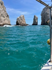 The beautiful blue water and arches de Arco on our excursion