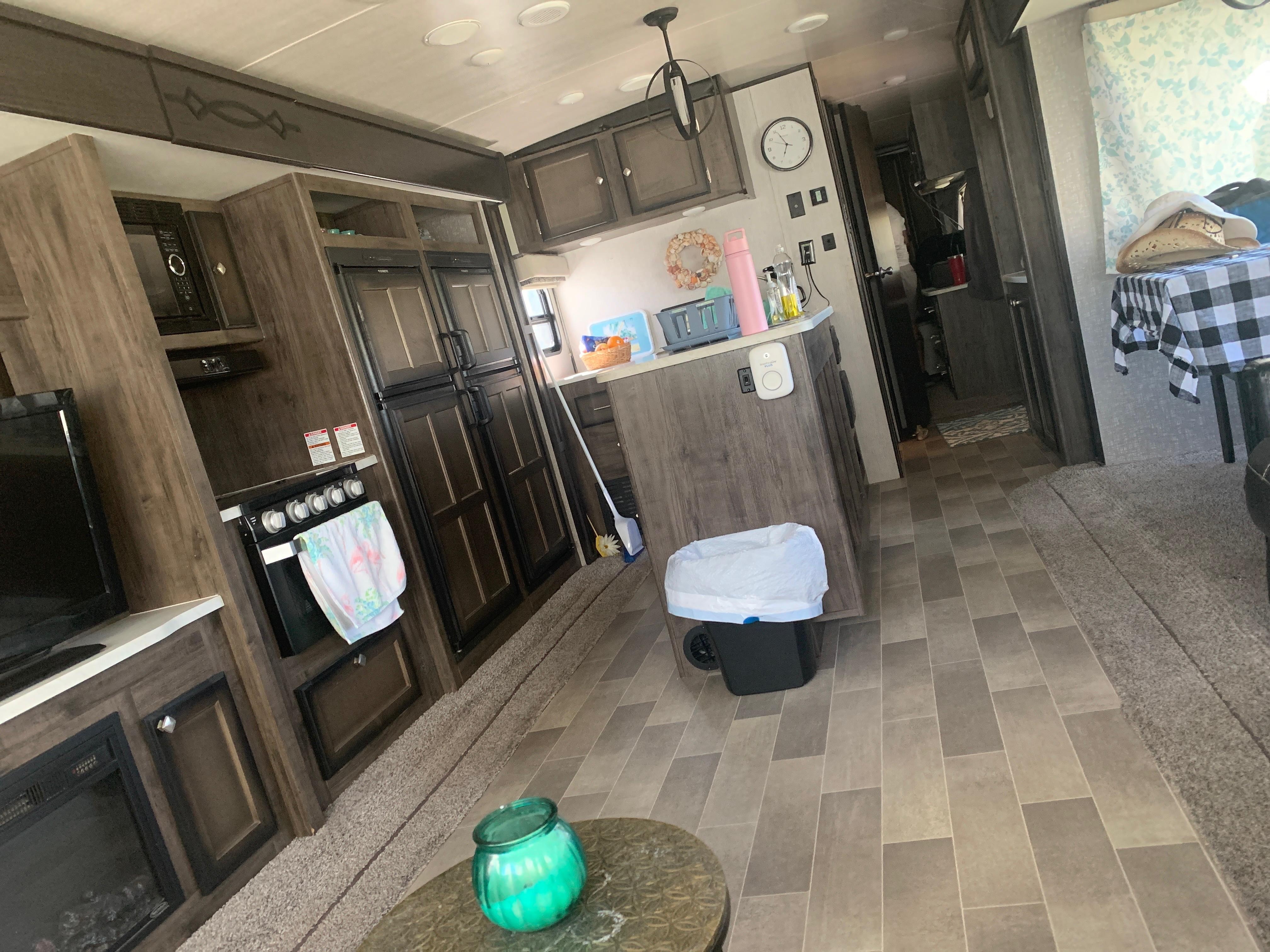 Awesome kitchen as viewed from the love-seat. 