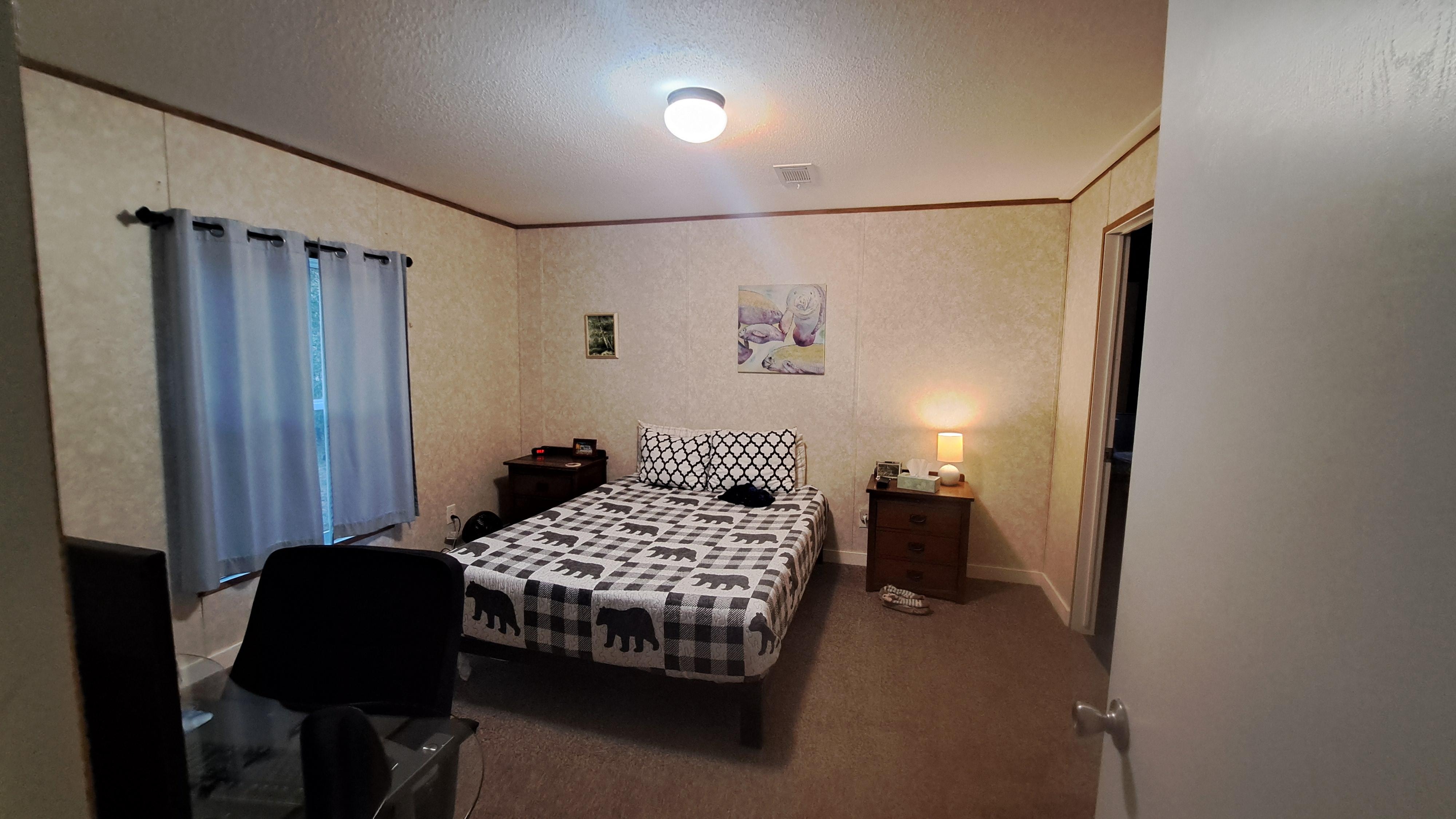 Master bedroom with laptop docking station 