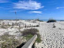 Beautiful beach access right on the property.