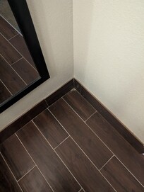 Dirt in corners of room