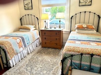 Guest room with seasonal bedding