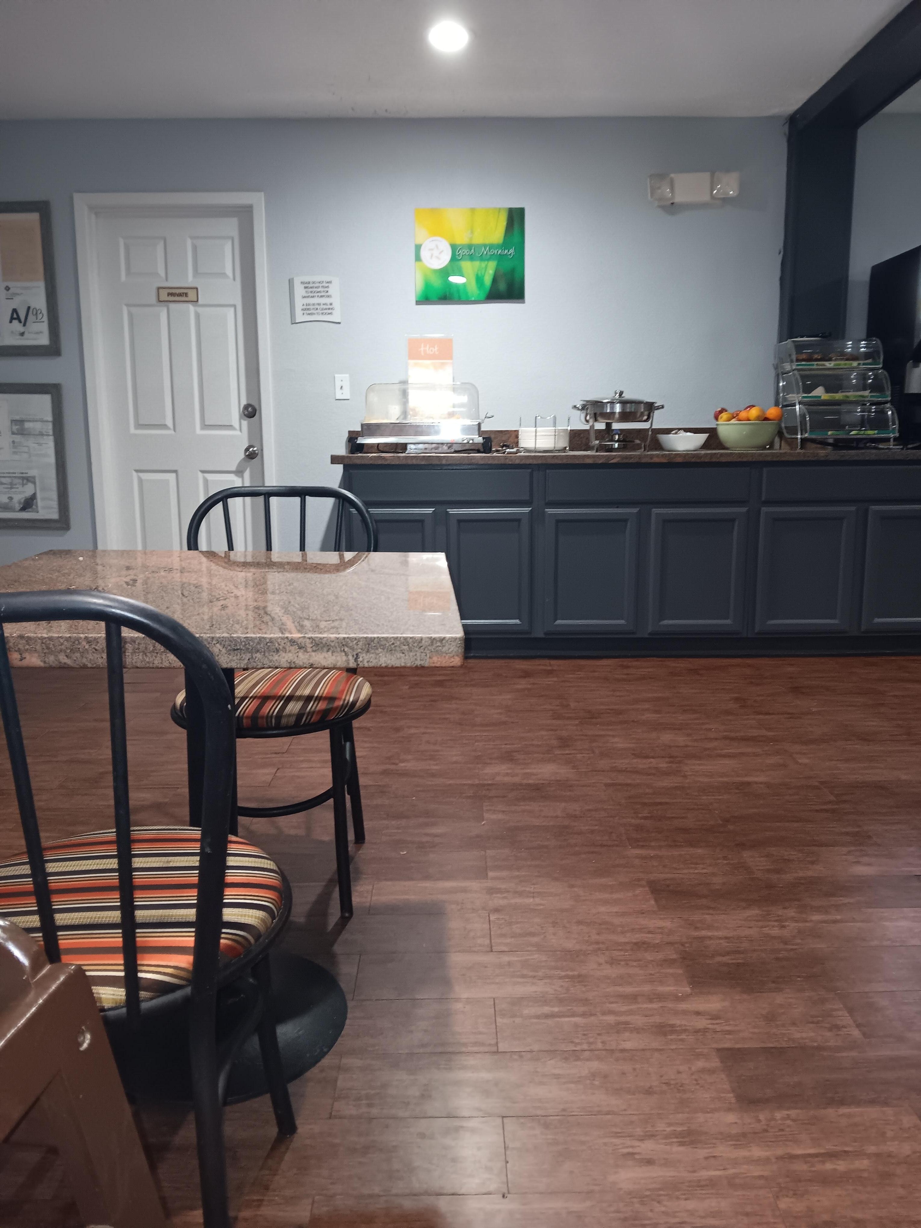 The sign that said they'll charge $50.00 if food goes out of this room. Not sure if that's a old sign? 