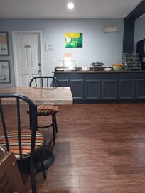 The sign that said they'll charge $50.00 if food goes out of this room. Not sure if that's a old sign?