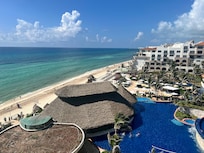 View from side balcony of pool & ocean.