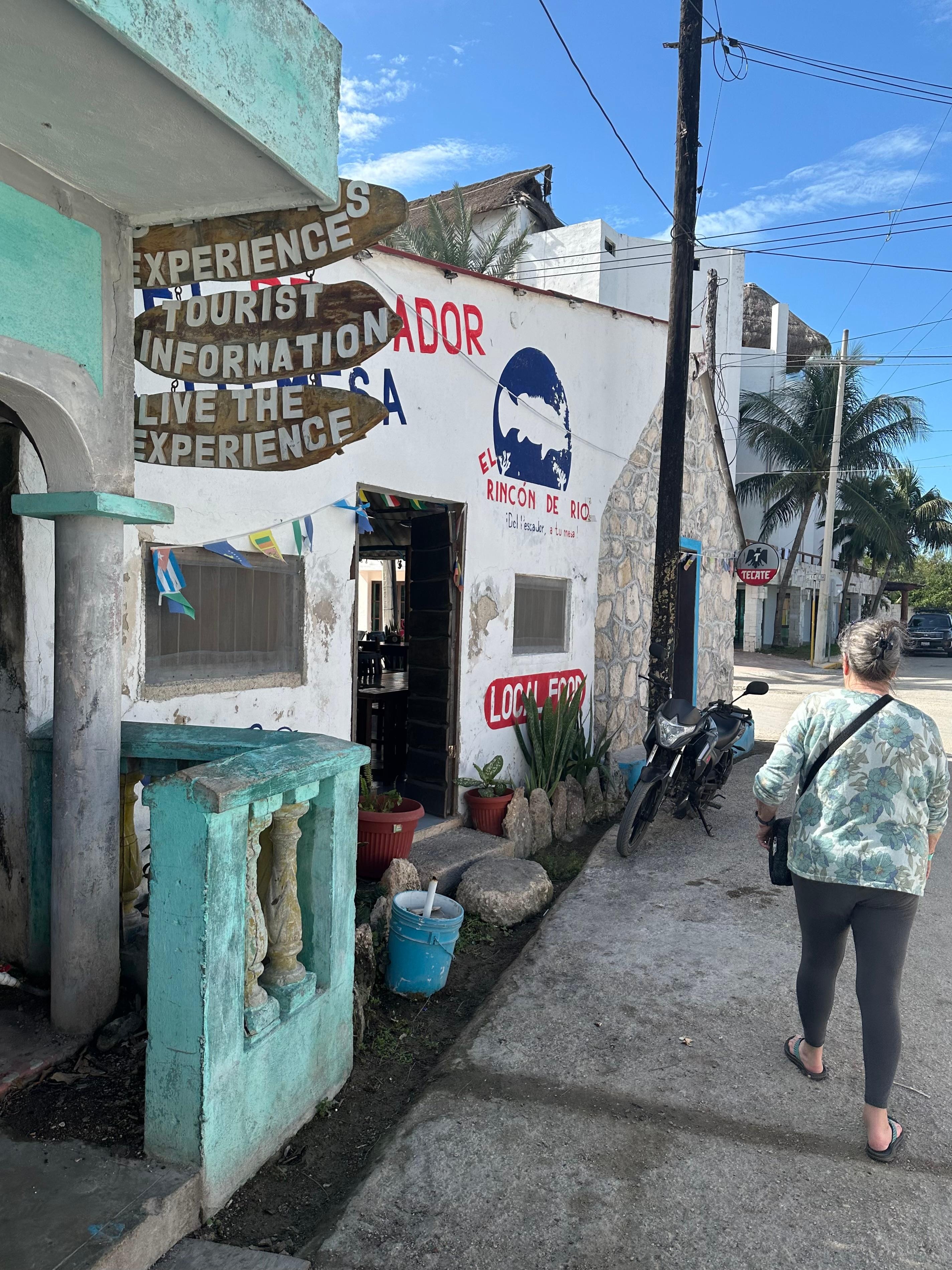 A restaurant across from the hotel advertising tourist information: resist the impulse!