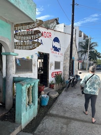 A restaurant across from the hotel advertising tourist information: resist the impulse!