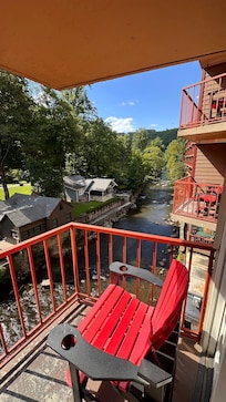 Balcony view from 209 with two comfortable chairs
