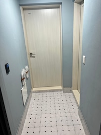 The room entrance where you remove your shoes and also connect to the bathroom. Very nice and clean and includes slippers!