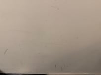 Scoff marks on wall