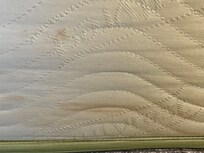 Bloody mattress with no fitted sheet