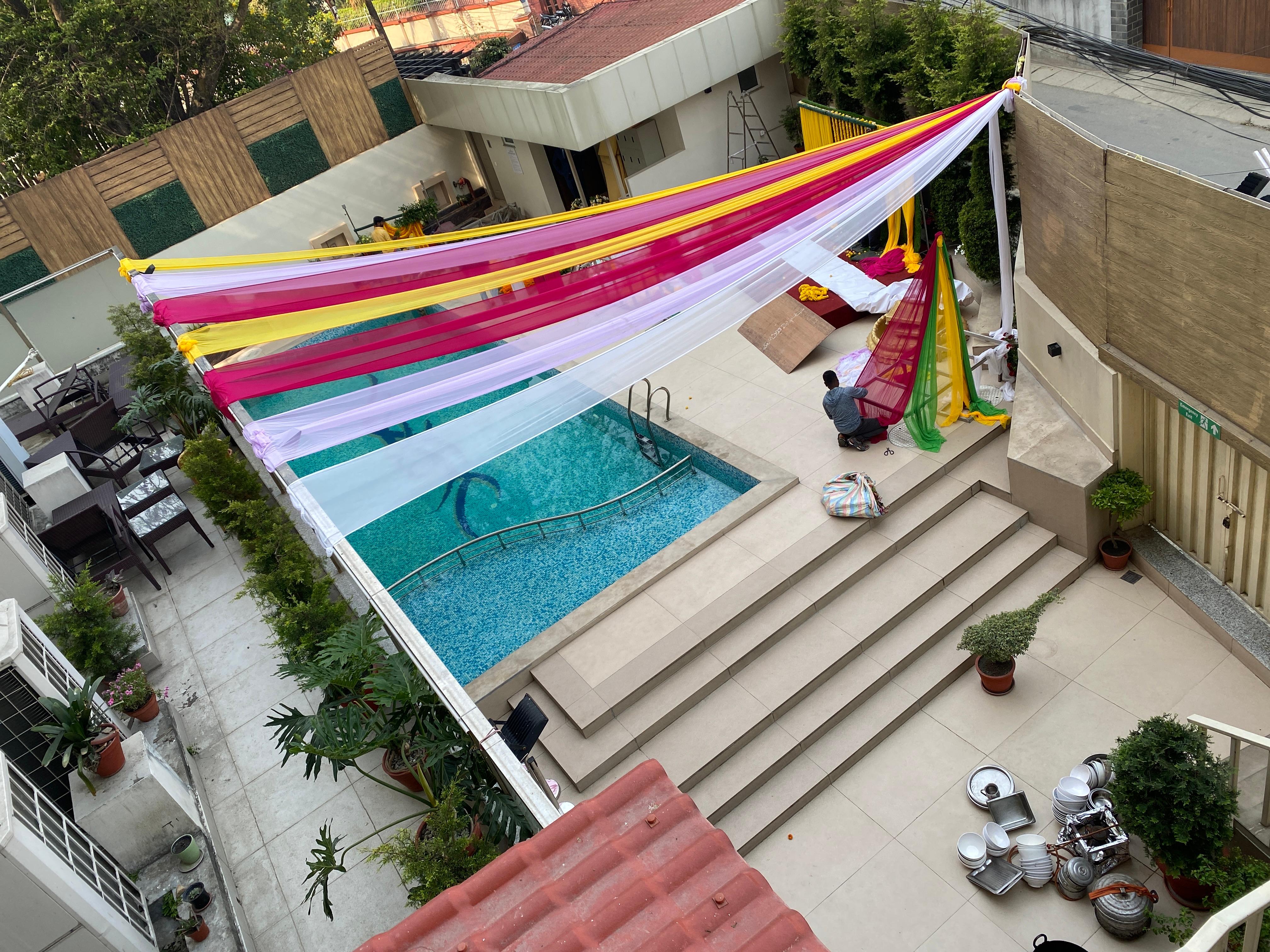 Poolside getting decked up for a party. Very clean. 