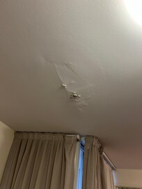 Leak from ceiling from apartment above overnight