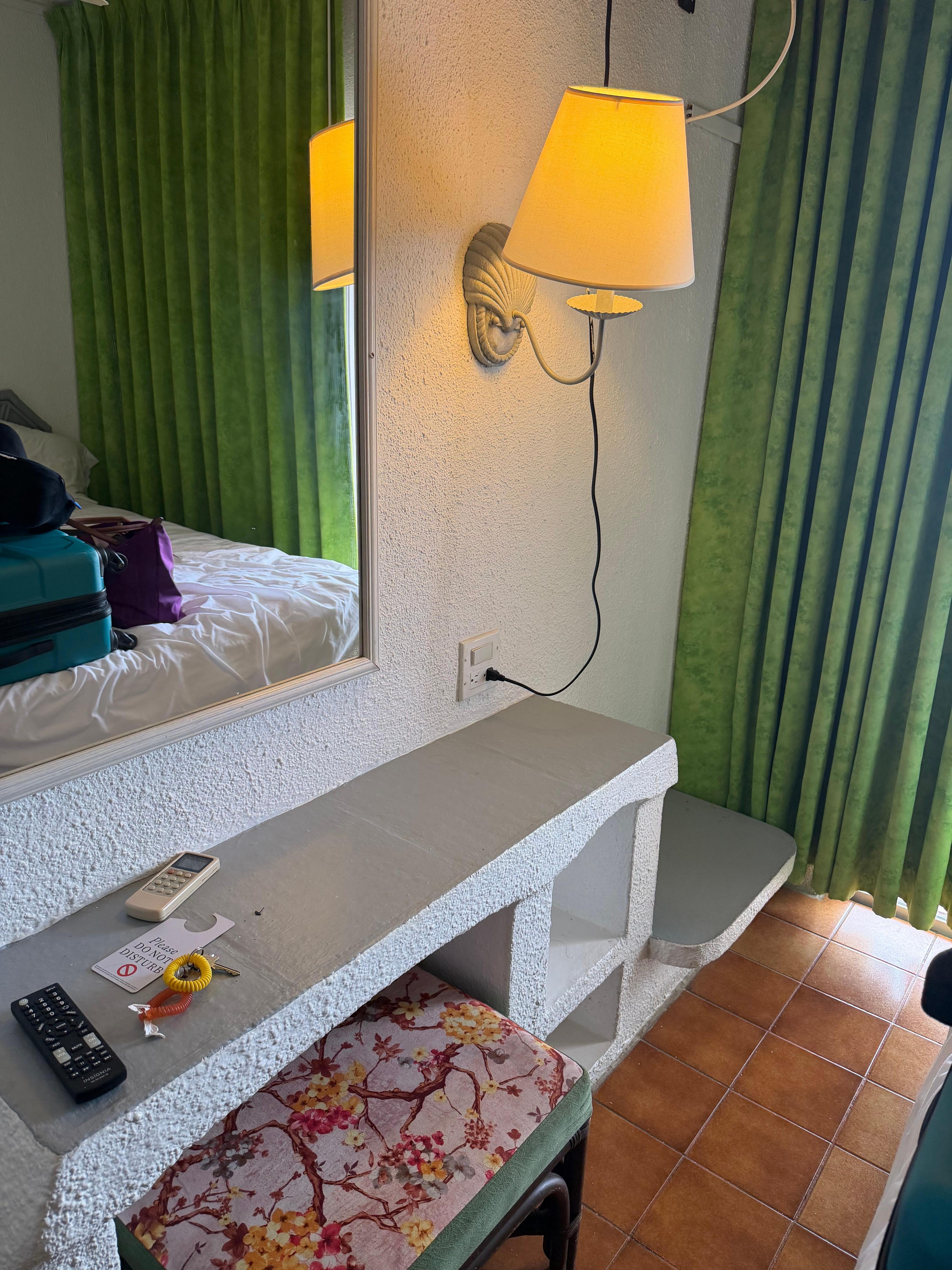 This tiny area was used for laying out clothes there are no dressers 