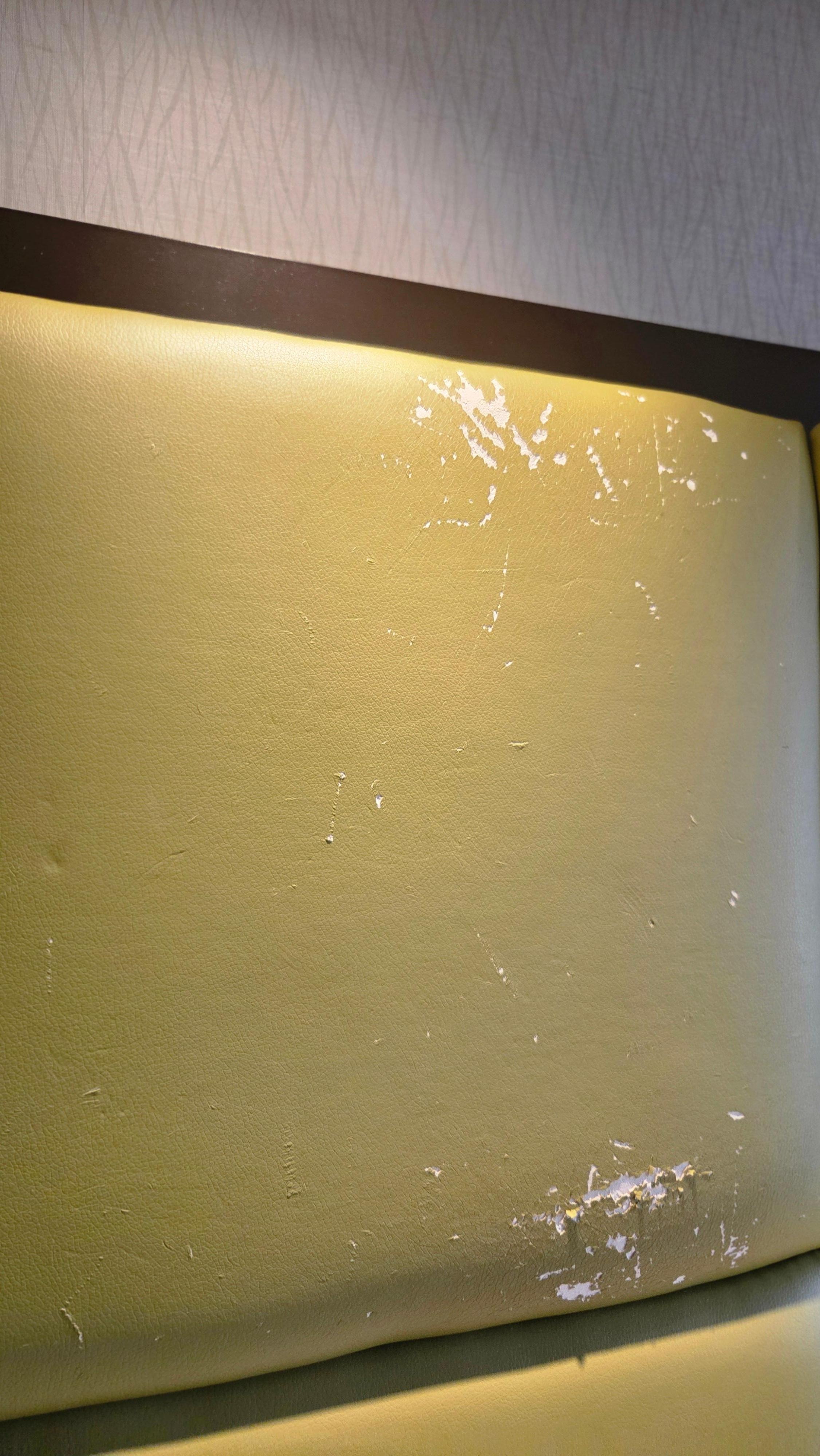 Headboard needs to be thrown in dumpster.